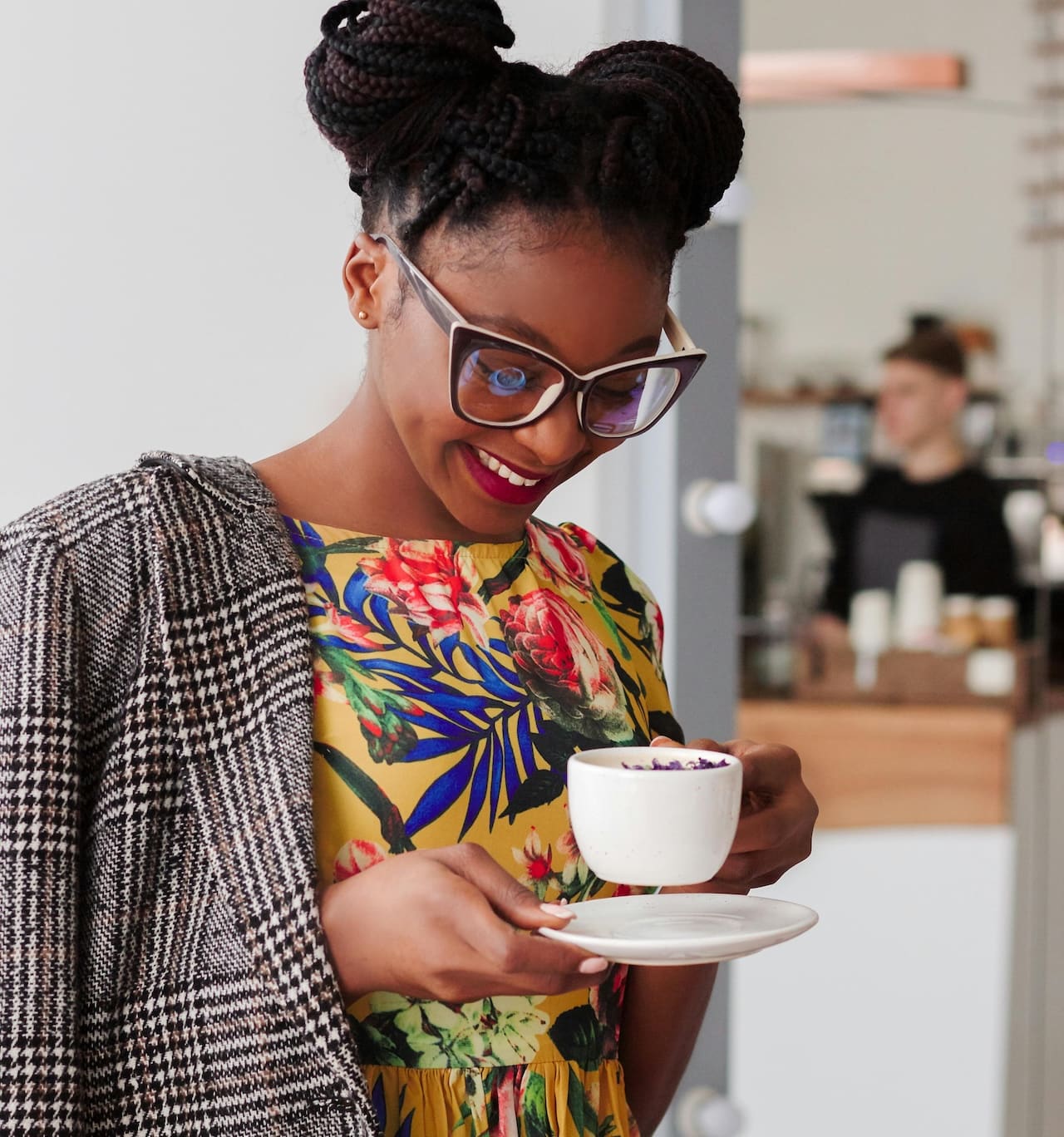 A happy woman with a cup of coffee